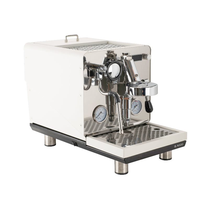Espresso machine with white body and metallic components on a white background