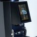Close-up of a coffee grinder with a digital display on a white background