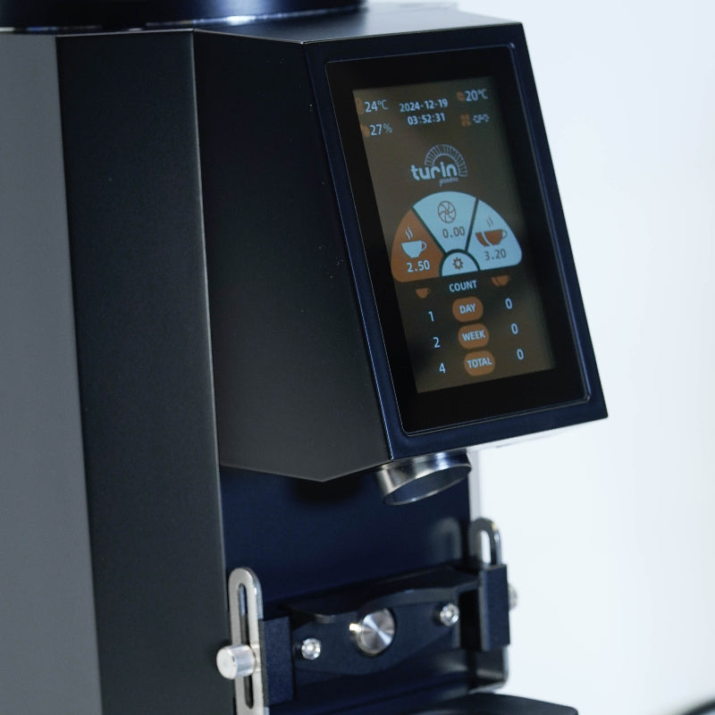 Close-up of a coffee grinder with a digital display on a white background