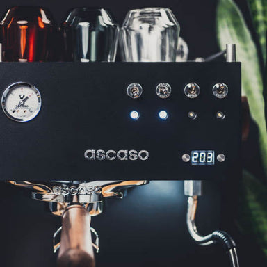Espresso machine with 'ascaso' branding on a dark background