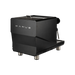 Black coffee machine with 'MANUS' branding on a white background