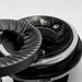 Close-up of a metallic gear system on a white background