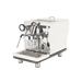 Espresso machine with white body and silver accents on a white background