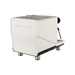 White coffee machine with 'MANUS' branding on a white background